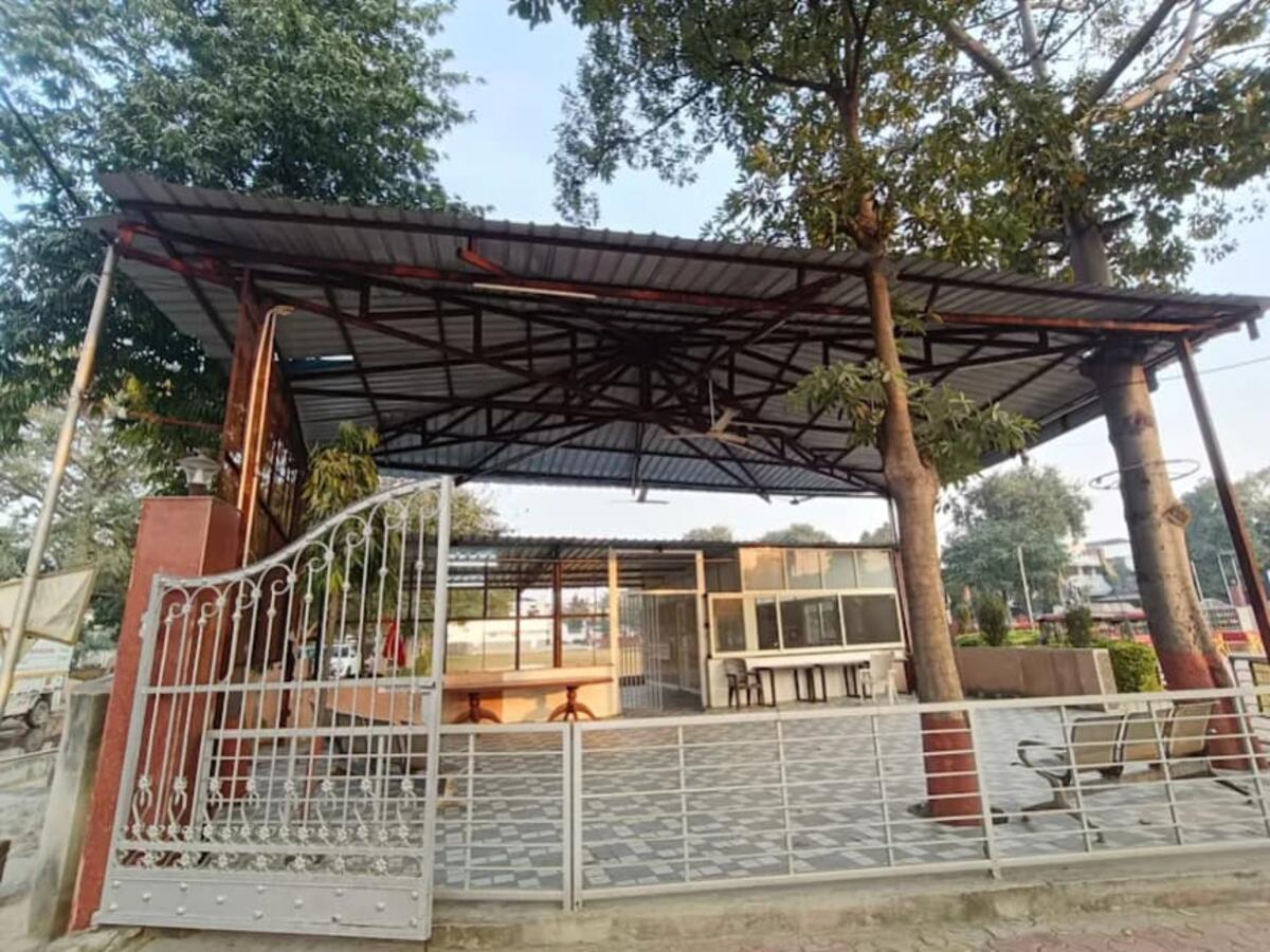 Open parking canopy shed with iron gate — R.R Teen Set Solution
